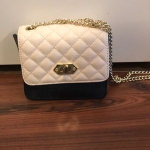 Steve Madden black and white clutch